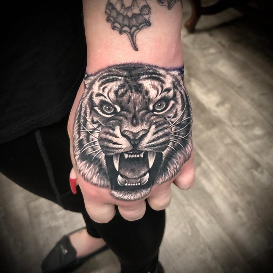 Tiger Hand Tattoo | Black Lotus Tattoo Tiger Hand Tattoo | Black Lotus Tattoo