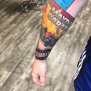 Lion And Flowers Tattoo
