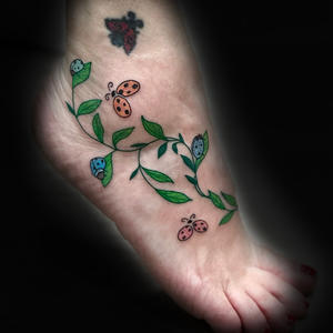 lady-bug-vines-foot-tattoo-kaitlyn-mcknight-knoxville.jpg