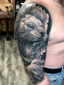 Lion Half Sleeve Tattoo