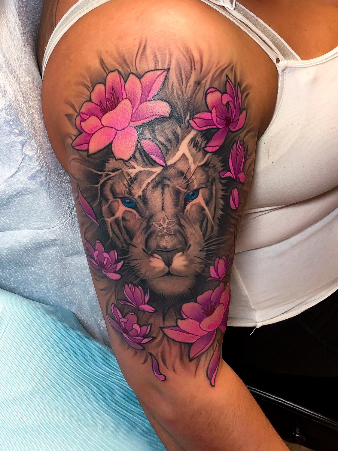 lion realism tattoo